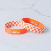 Tap To Pray Wristband in Orange and White Checker