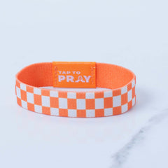 Tap To Pray Wristband in Orange and White Checker