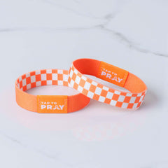 Tap To Pray Wristband in Orange and White Checker