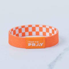 Tap To Pray Wristband in Orange and White Checker